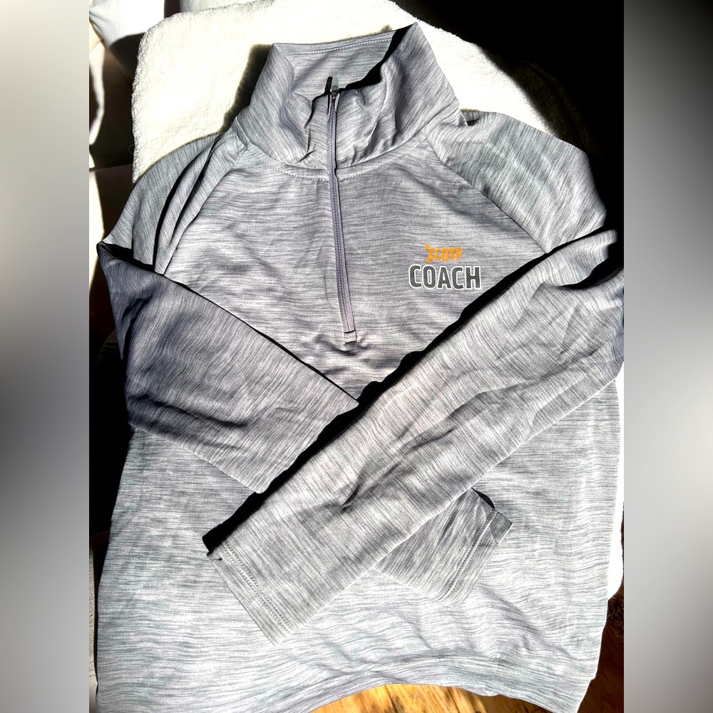 Coach’s OTF Nike pullover
